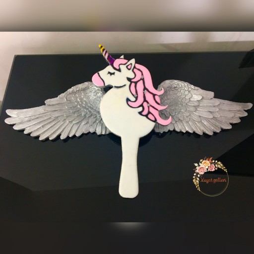 آینه رزینی همراه با بال فرشته