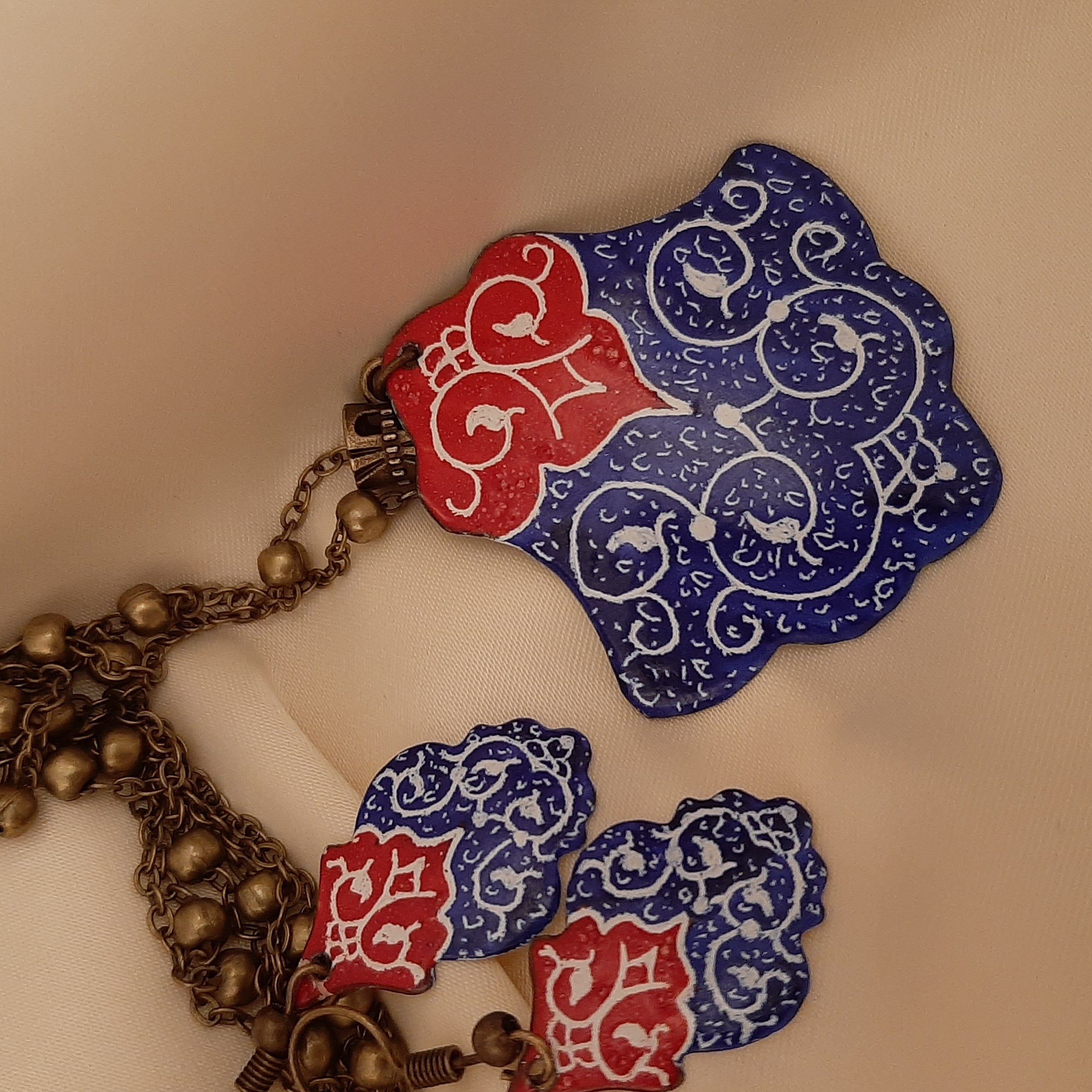 گردنبند و گوشواره سرخابی