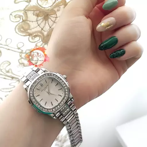 ساعت پتک فیلیپ شیشه تراش مجلسی  زنانه کیفیت عالی patek philippe نقره ای و طلایی