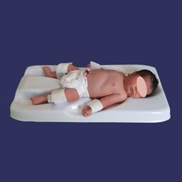 تخت نگهدارنده کودک بیبی فیکس برای ختنه 