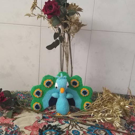 عروسک طاووس دستبافت قد 18 سانت