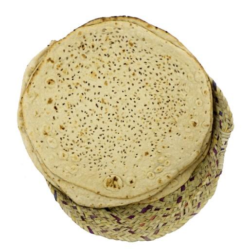 نان تافتون کامل، محصولی از مجموعه غذای سالم 《نون》تهیه شده از آرد سبوس دار گندم خراسان و نمک دریا از طریق تخمیر طبیعی