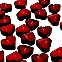 شمع وارمر مدل قلب دارای طیف رنگی قرمز وزرشکی