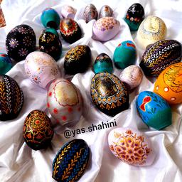 تخم‌ مرغ رنگی شب عید تخم مرغ سفره هفت سین .تخم‌مرغ سفالی رنگ‌شده ی عید نوروز تخم