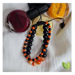 دستبند زنانه دو ردیفه  با سنگ های مشکی و نارنجی مناسب تابستان و پاییز