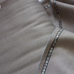 پارچه کت فاستونی سیناتکس فام ترکیبی نسکافه ای و مشکی - طرح فیلافیل - قواره 1.80 متری
