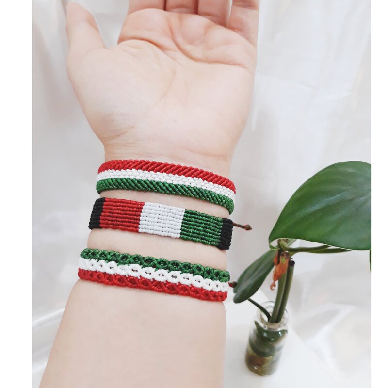 دستبند  پرچم ایران ،بافته شده با نخ مونزده ،هم طرح مناسب آقایان و هم خانم ها 