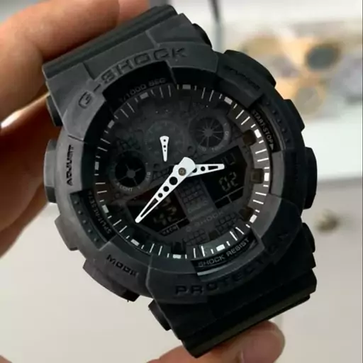 ساعتمچی مردانه و پسرانه کاسیو جی شاک بند و بدنه رزین دوزمانه کرنوگراف رنگ مشکی casio G-shock