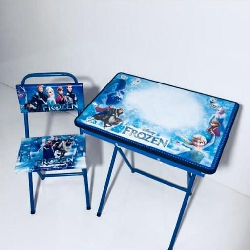 میز تحریر باکسدار  همراه با صندلی طرح فروزن با چاپ یووی  اکلیلی برجسته (مدل پایه رنگی)(با کارتون شکیل مخصوص میز و صندلی)