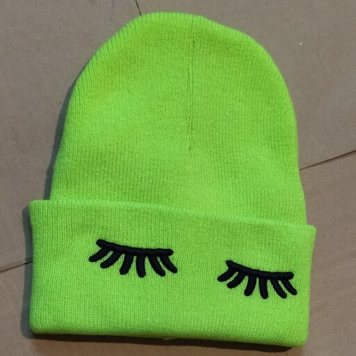 کلاه زمستونی بافت طرح چشم سبز فسفری با ارسال رایگان 