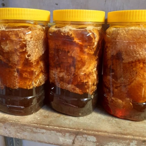 عسل چند گیاهی طبیعی و( خامه عسل و سر عسل ) یک کیلو گرم