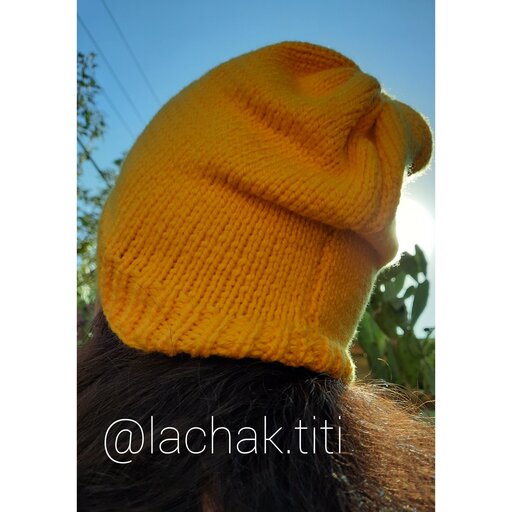 کلاه زنانه و مردانه دستبافت رنگ زرد اسپرت جنس کاموا ایرانی برای دورسر  54  مناسبهپوم پوم دارکاملا دستبافت 