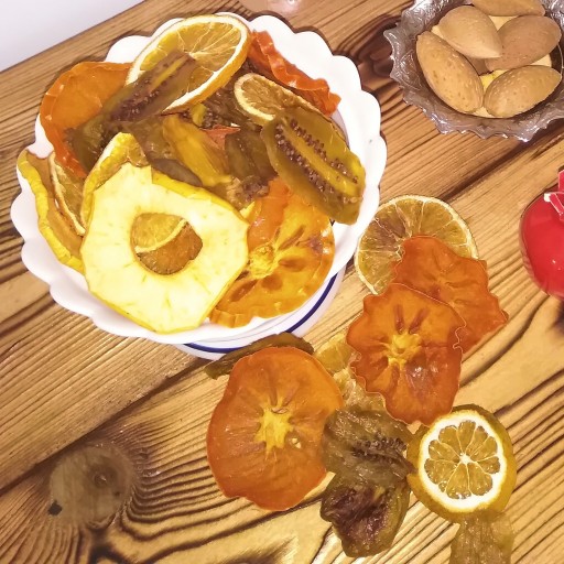 میوه خشک مخلوط کیوی وسیب و پرتقال و خرمالو