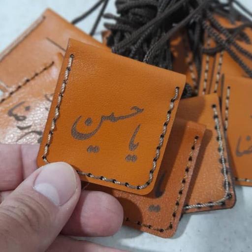 حرز دست نویس امام جواد علیه السلام روی پوست آهو به همراه گردن آویز چرم طبیعی