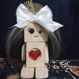 عروسک چوبی دستساز چشم نامتقارن