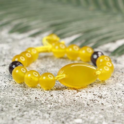 
دستبند عقیق زرد و آمتیست و میانکار عقیق زرد شرف الشمس 
