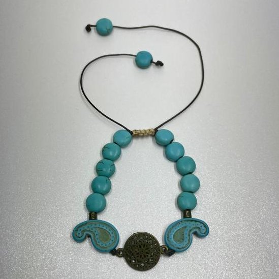 دستبند مدل آسانسوری با مهره های طرح فیروزه آبی طرح بته جقه و عدسی و خرج کار برنزی شمسه 