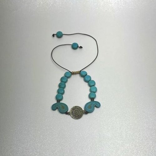 دستبند مدل آسانسوری با مهره های طرح فیروزه آبی طرح بته جقه و عدسی و خرج کار برنزی شمسه 