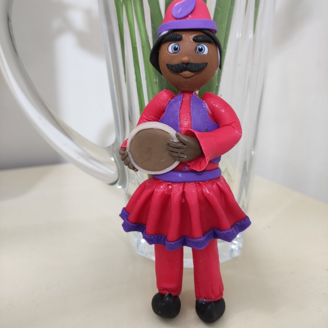 حاجی فیروز جنس خمیر چینی قد عروسک15سانتیمتر