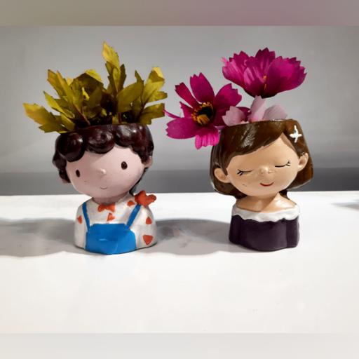 گلدان دختر و پسر پلی استری بامزه 10سانت در چند طرح مختلف و زیبا