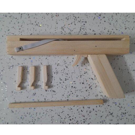 اسباب بازی چوبی تفنگ چوبی مازندچوبین باقابلیت پرتاب تیرچوبی به همراه 3 عدد تیر چوبی  