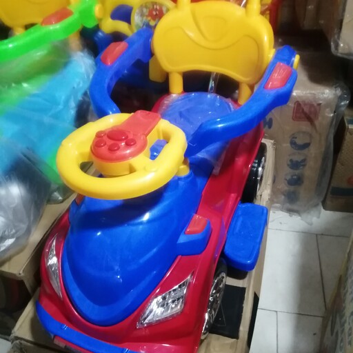 ماشین حمل کودک مجیکار (مجیک کار) بیبی لند در رنگ بندی های مختلف موزیکال و دسته متحرک