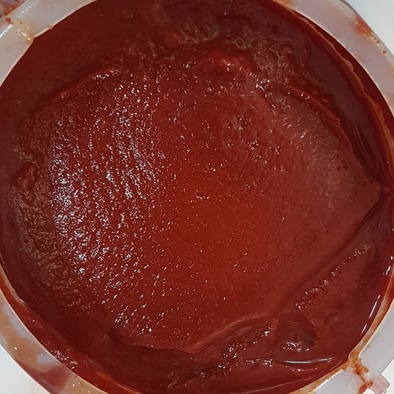 رب گوجه فرنگی خانگی ارمغان تندرستی ( بسته بندی دو کیلو و پانصد گرم )