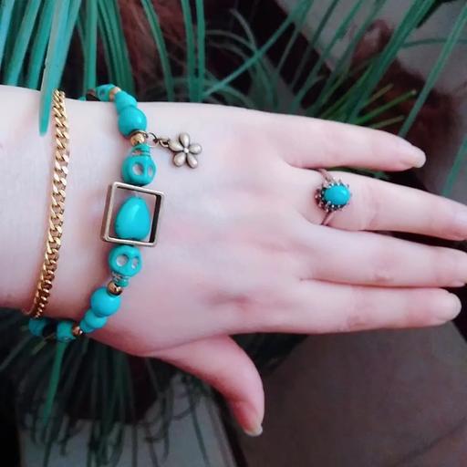دستبند فیروزه اشکال و برنز با آویز گل و ستاره