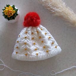 کلاه دختدانه ،دست بافت و مرواریدی،بافته شده با کاموای ایرانی ،مناسب   برای نوزاد