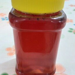 عسل طبیعی قرمز فارس کاملا ارگانیک بدون تغذیه مصنوعی خوشرنگ خوش طعم به یادماندنی به شرط مستقیم اززنبوردار یک کیلو