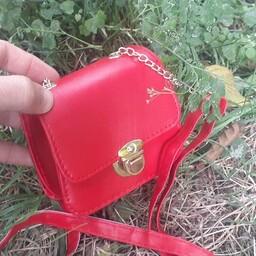 کیف دخترانه پاسپورتی رنگ قرمز از برند زارا zara جنس رویه چرم جنس بند چرم ارسال رایگان 