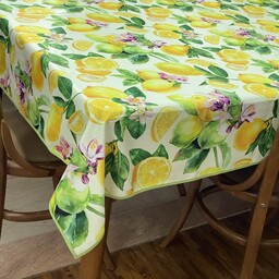 رومیزی نقشین جنس کتان هازان طرح لیموی درشت و شکوفه های بنفش سایز میز 6 نفره در ابعاد 200در 140 سانتیمتر