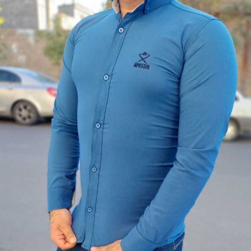 پیراهن مردانه آبی نفتی کشی اندامی ساده آستین بلند 