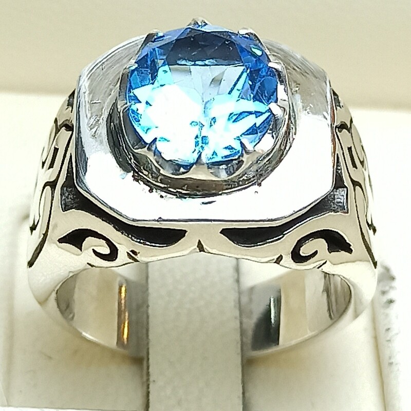 انگشتر توپاز سوئیسی آبی الماس تراش نقره کار دست ساز