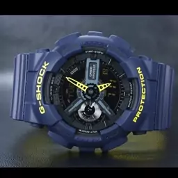 ساعت  مچی جی شاک GA110 سرمه ای زرد  (جیشاک GShock) ، صد در صد ضدآب ، تنظیم اتوماتیک با پایتخت کشورها ، اتولایت دار