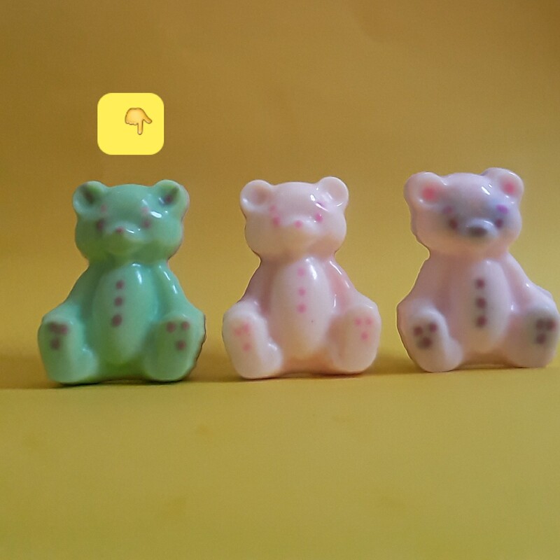 عروسک خرس نرمالو سه بعدی(ضداسترس) دو رنگ یک رنگ بنفش رنگ دیگر سبز