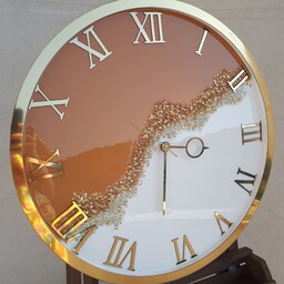 ساعت دیواری رزینی قطر 50 سانت طرح خورشید کار شده با کرزستال و طلای مایع هنری