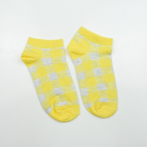 جوراب مچی دخترانه طرح چهارخونه ریز بافت رنگ زرد و سفید تولیدی پیدو
