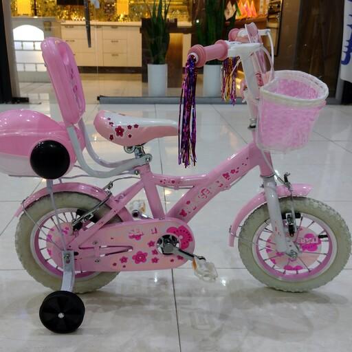 دوچرخه سایز 12 صورتی دخترانه سبد پشتی دار طوقه آلومینیوم پره موتوری