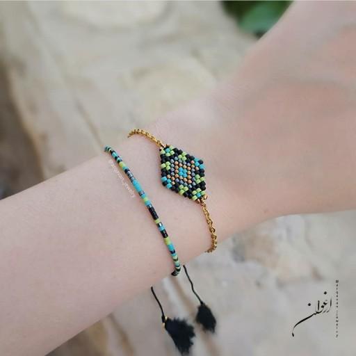 دستبند زنانه با منجوق میوکی ژاپنی و قفل و زنجیر استیل، رنگ دستبند دقیقا مطابق عکس، سایز 16سانتیمتر با 5سانت اضافه زنجیر
