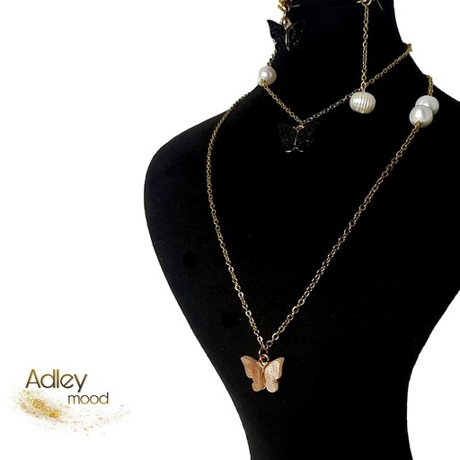 ست زنانه استیل طلایی طرح پروانه طلایی و مروارید پرورشی گردنبند دستبند گوشواره