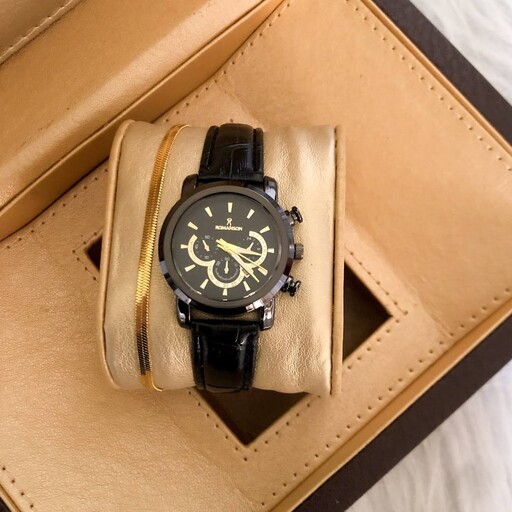 ساعت زنانه بند چرم مشکی رومانسون همراه دستبند ماری طلایی