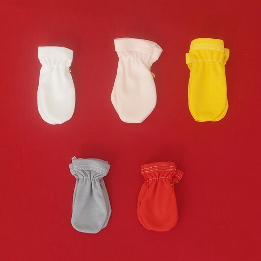 دستکش نوزادی در هفت رنگ ( سفید . قرمز .گلبهی کمرنگ . زرد  ، طوسی ، آبی و سبز  ) فقط همراه لباس قابل ثبت سفارش می باشد .