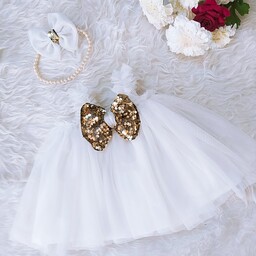 لباس کودک ونوزاد  سفید پاپیو ن پولکی .همراه با گل سر ست لباس .مناسب زیر یک سال قد لباس 36