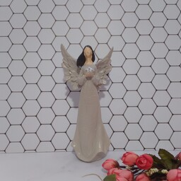 مجسمه فرشته با کبوتر مدل ایستاده  جنس پلی استر  قابل شستشو مناسب هدیه