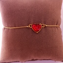 دستبند زنانه طلایی طرح قلب آسانسوری رنگ ثابت نیل