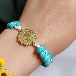 دستبند سنگی فیروزه  دوردیفه با پلاک استیل گل آفتابگردان با بند کشویی