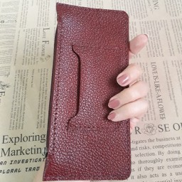 کیف دستی زنانه چرم بزی زرشکی دستدوز ساده و کاربردی