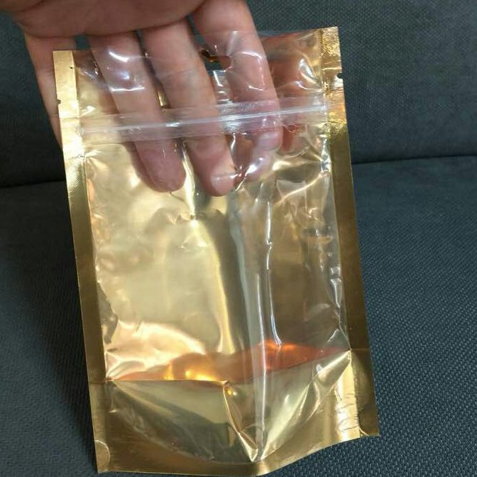 پاکت 11در15 یکرو شفاف طلایی  ایستاده زیپ دار50گرمی 