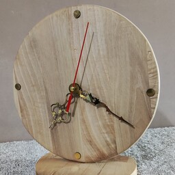 ساعت های رومیزی چوبی در ابعادقطر 20سانت الی 30سانت ساخته شده با چوب گردو و چنار و زیتون موتور آرام گرد و بی صدا 